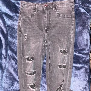 Black skinny jeans with rips